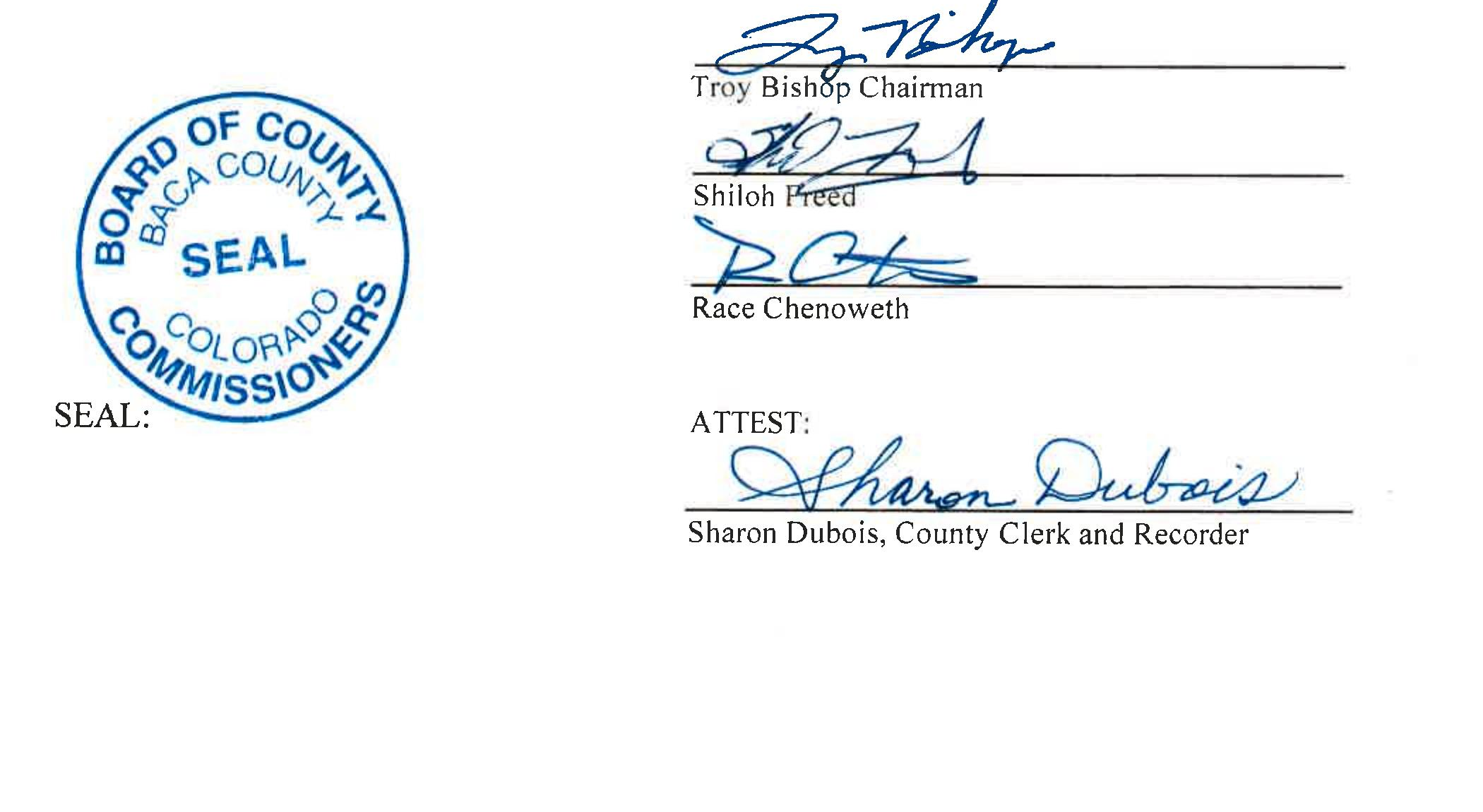 Signature block for the first reading of Ordinance No. 7, adopted March 26, 2026. Shows the embossed Baca County, Colorado Board of County Commissioners seal on the left, and four handwritten signatures on the right: Troy Bishop, Chairman; Shiloh Freed; Race Chenoweth; and below the word ATTEST, Sharon Dubois, County Clerk and Recorder.